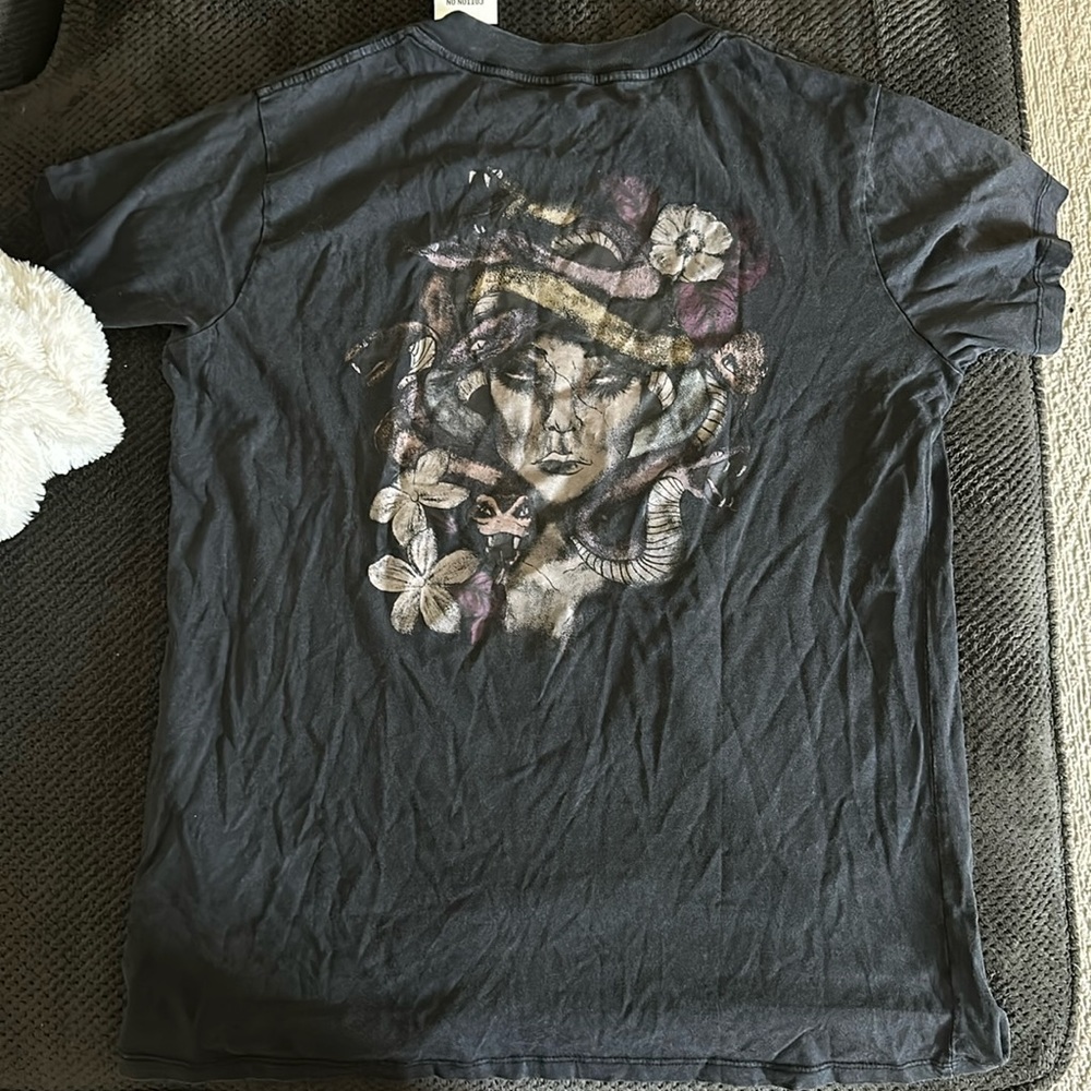 Black T-shirt never worn! Size large, tags still on, from cotton on!